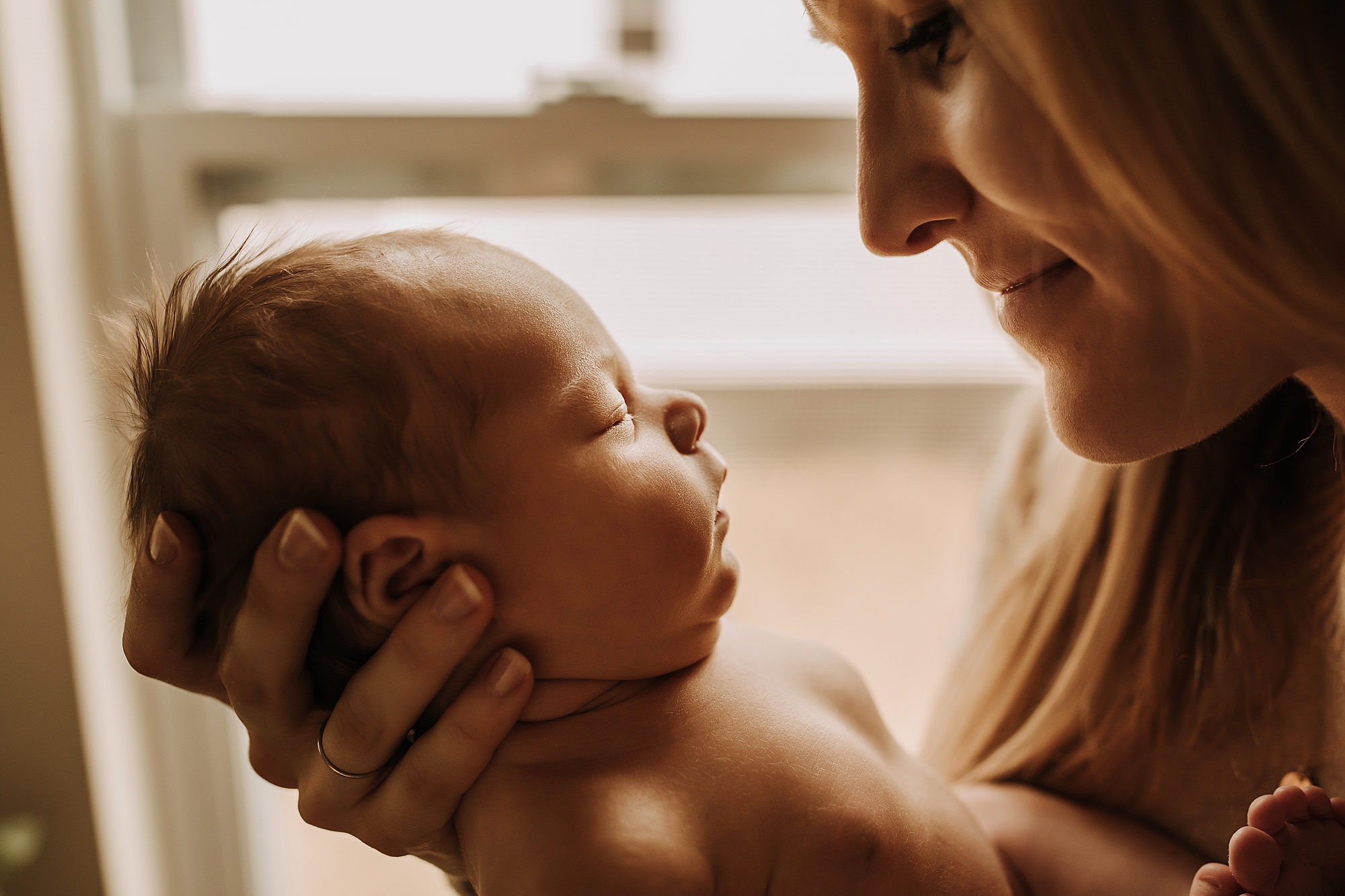 lifestyle newborn photographer michigan